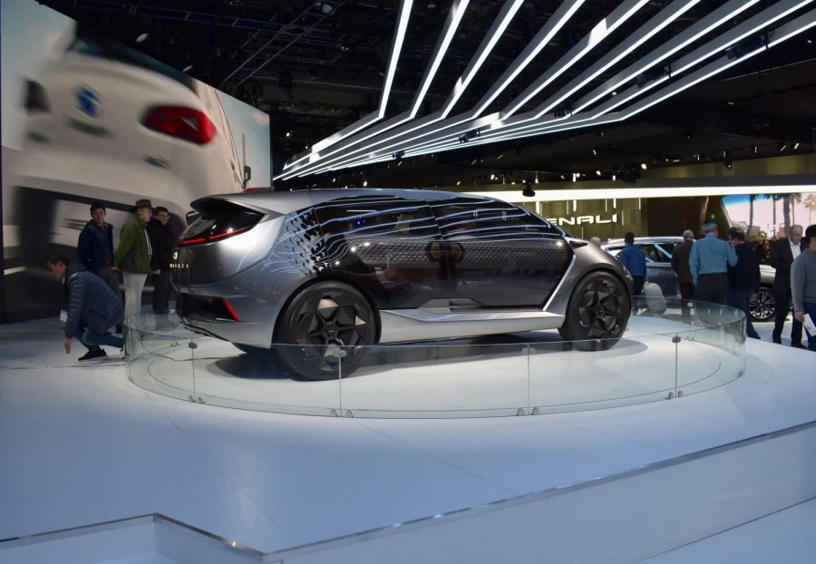 A futuristic car is displayed at GAC. 