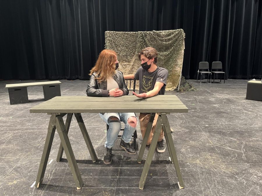 Student director Nick Viselli coaching Naomi Parr to prepare for their performance of Woman and War this Saturday at 5