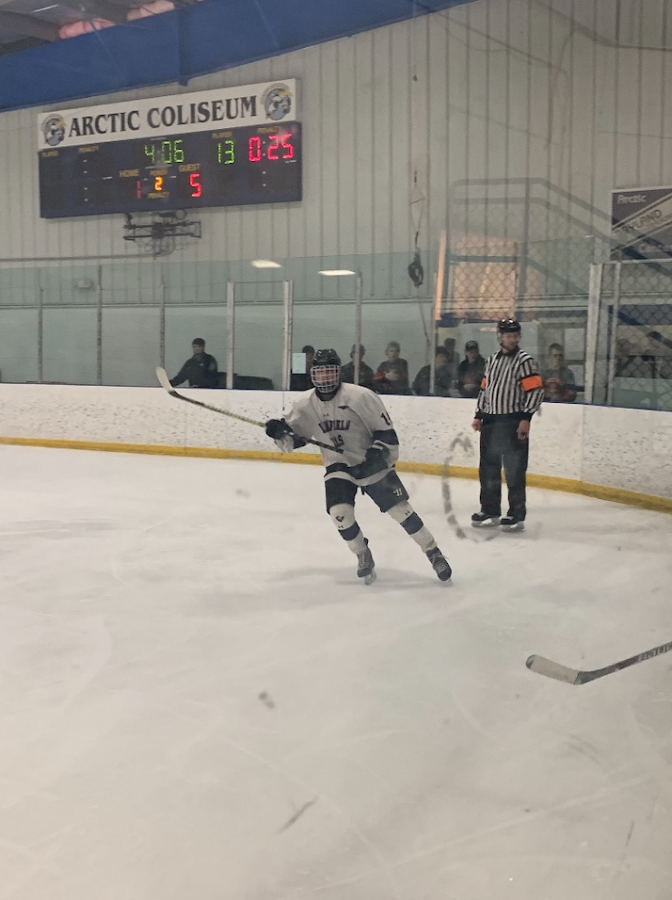 Boys Hockey Moves on in Playoffs