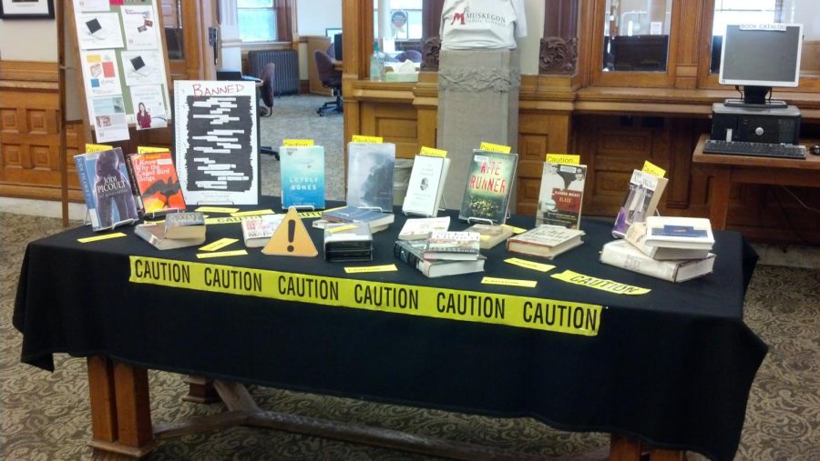 A+school+library+displays+previously+banned+or+challenged+books+during+Banned+Books+Week