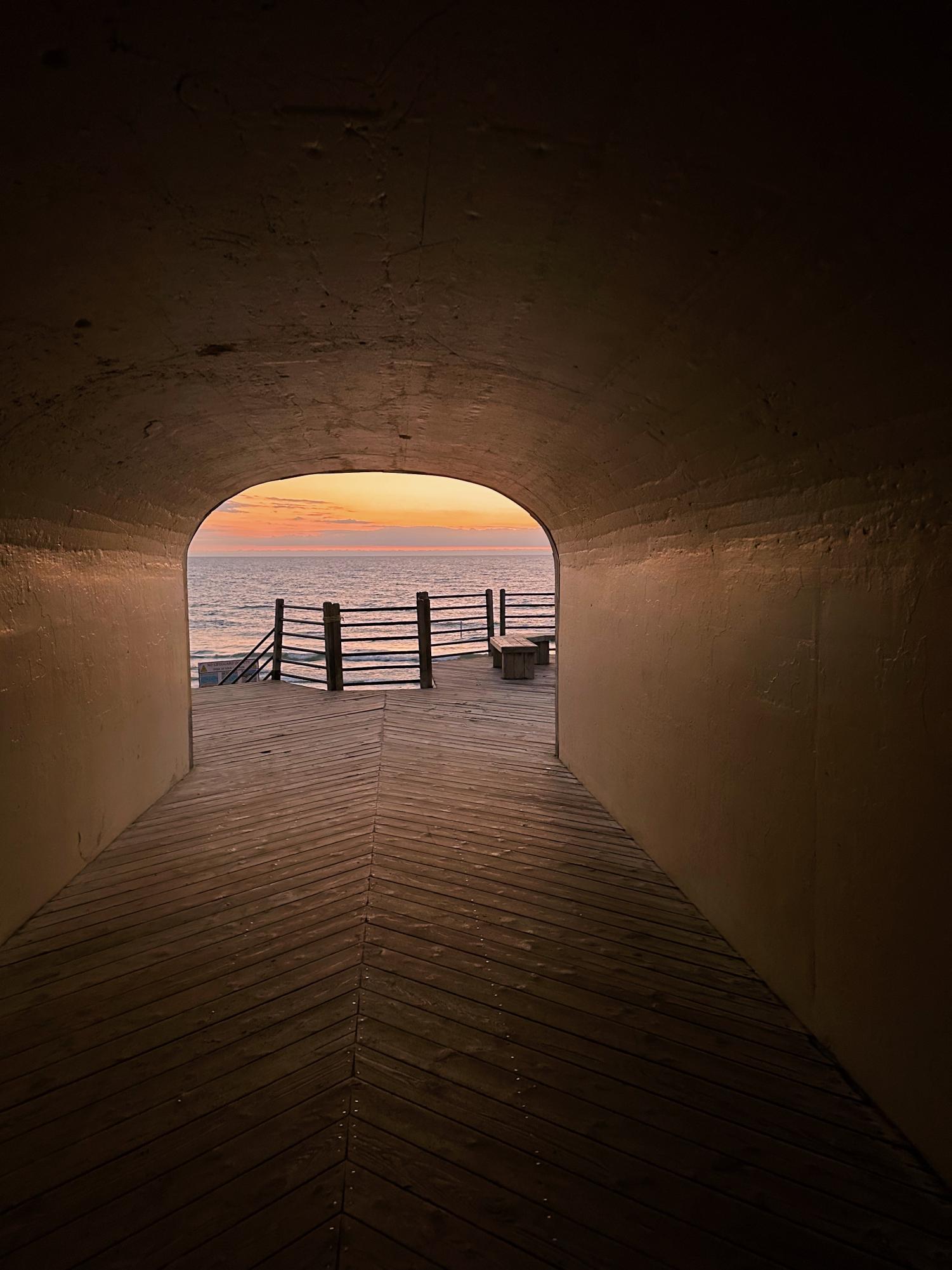 Tunnel Park in Holland is a popular beach that attracts many visitors for lake activities or relaxing in the sun. Tourists and locals visit at dusk to watch the beautiful sunset over Lake Michigan. 