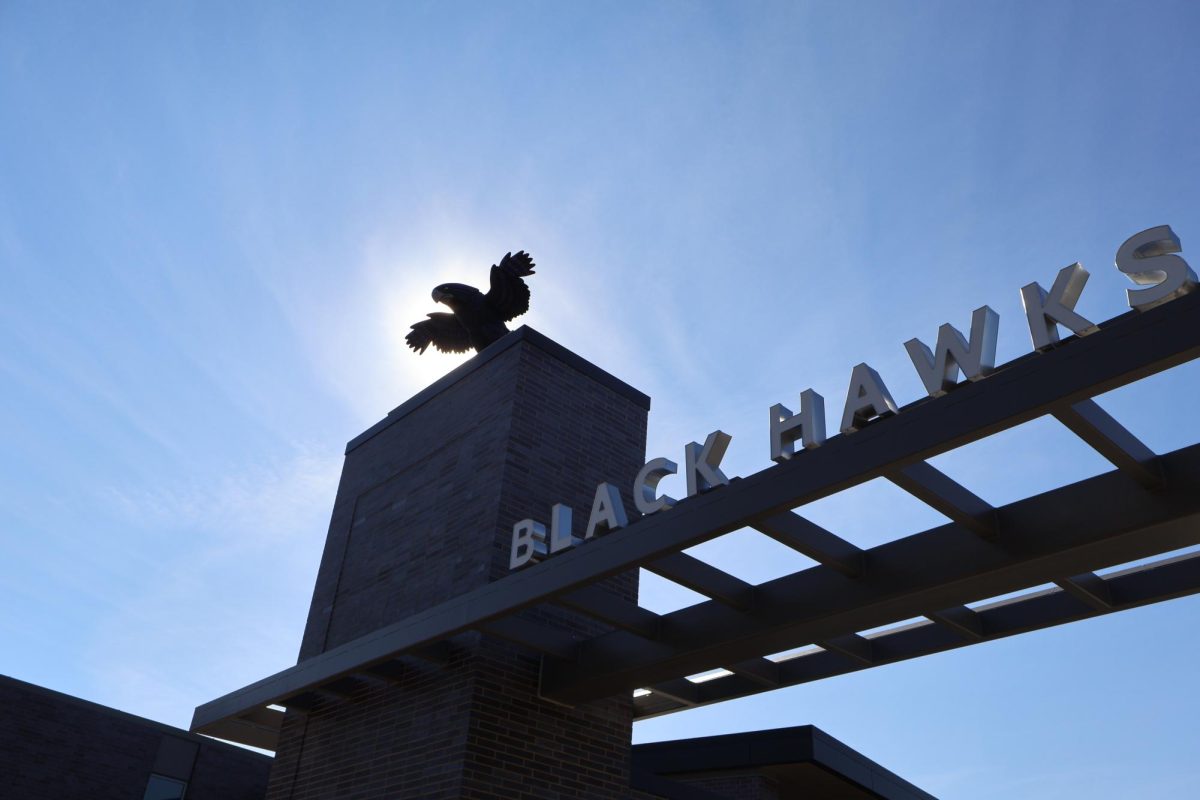 The new Black Hawk statue, recently named Bartholomew H. Hawk Senior (BHHS), soars over the new athletic entrance and signage. 