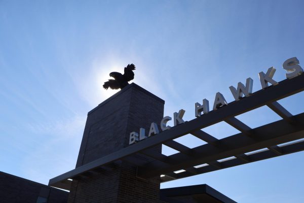 The new Black Hawk statue, recently named Bartholomew H. Hawk Senior (BHHS), soars over the new athletic entrance and signage. 