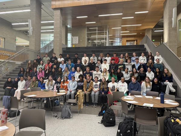 Students gather in the main commons to hear advice from Kim Bryant and work through practical writing exercises. 